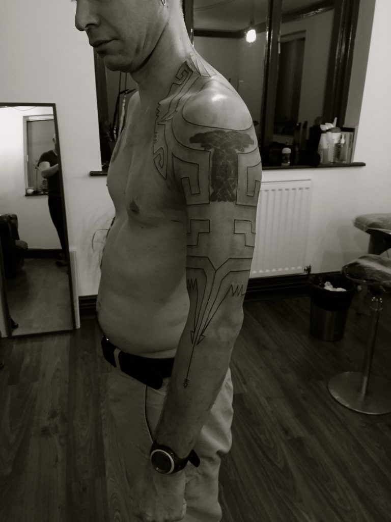 Hanumantra blackwork tattoo abstract aztec mayan inspired coverup 01